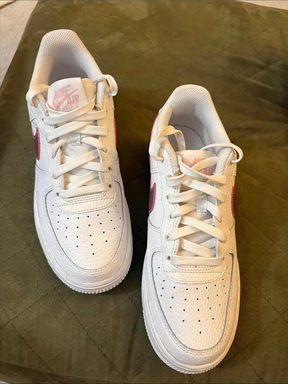 Nike Air Force White Sneakers with Pink Swoosh